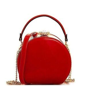 La Terre Fashion Peta Approved Vegan Handbag Red Changeable Strap Circle round.